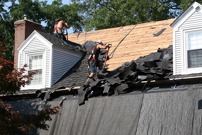 1Removal of existing shingles and roof deck inspection